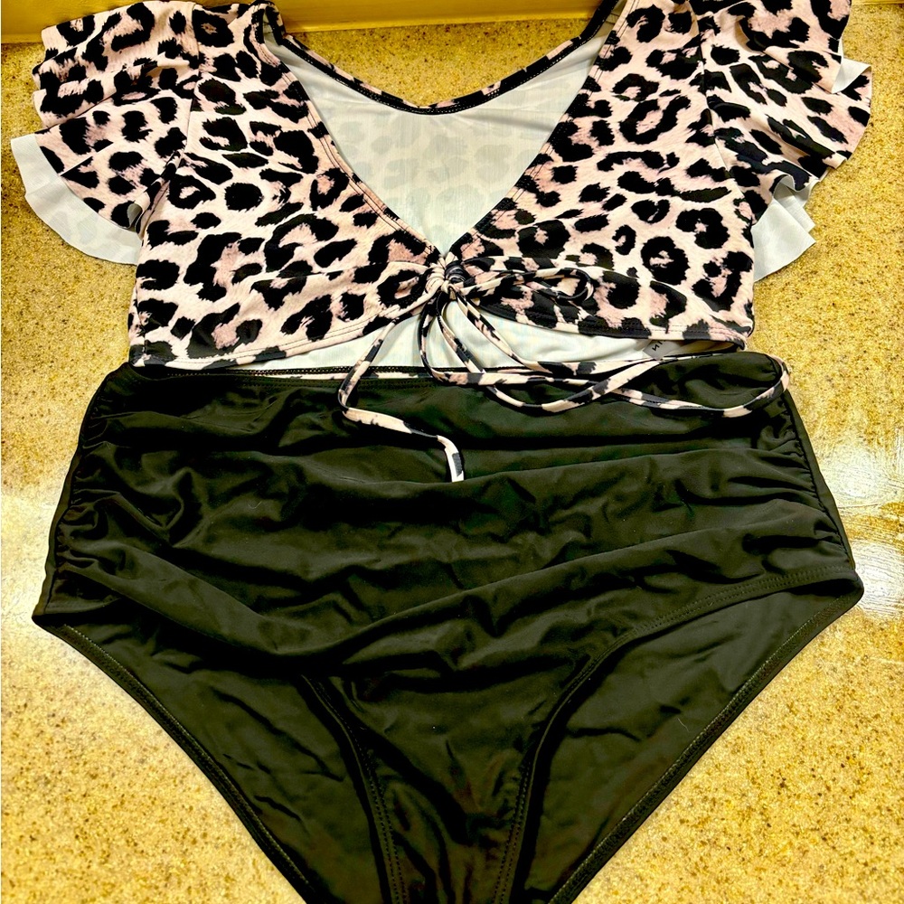 Bikini with high waisted bottoms. Very figure flattering!